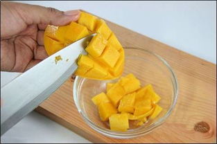 怎么切芒果好看又好吃,怎样切芒果最简便方法